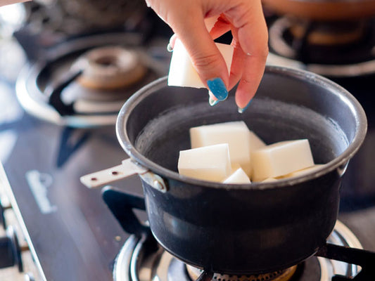 Melting solid-at-room-temperature oils to make cold process soap