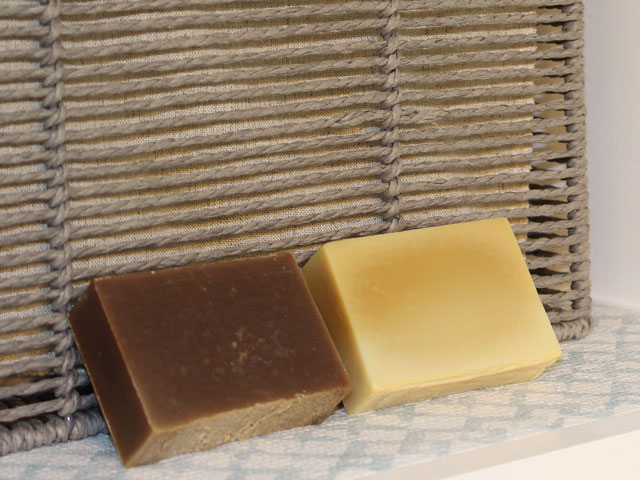 Two bars of sudsy beer soap
